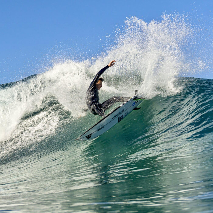 Surfer with Wildsuits eco wetsuit